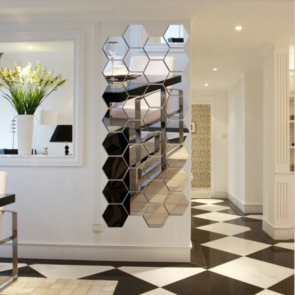 Silver hexagonal acrylic mirror wall sticker with PS build, 100x85x50mm, on a wall surface