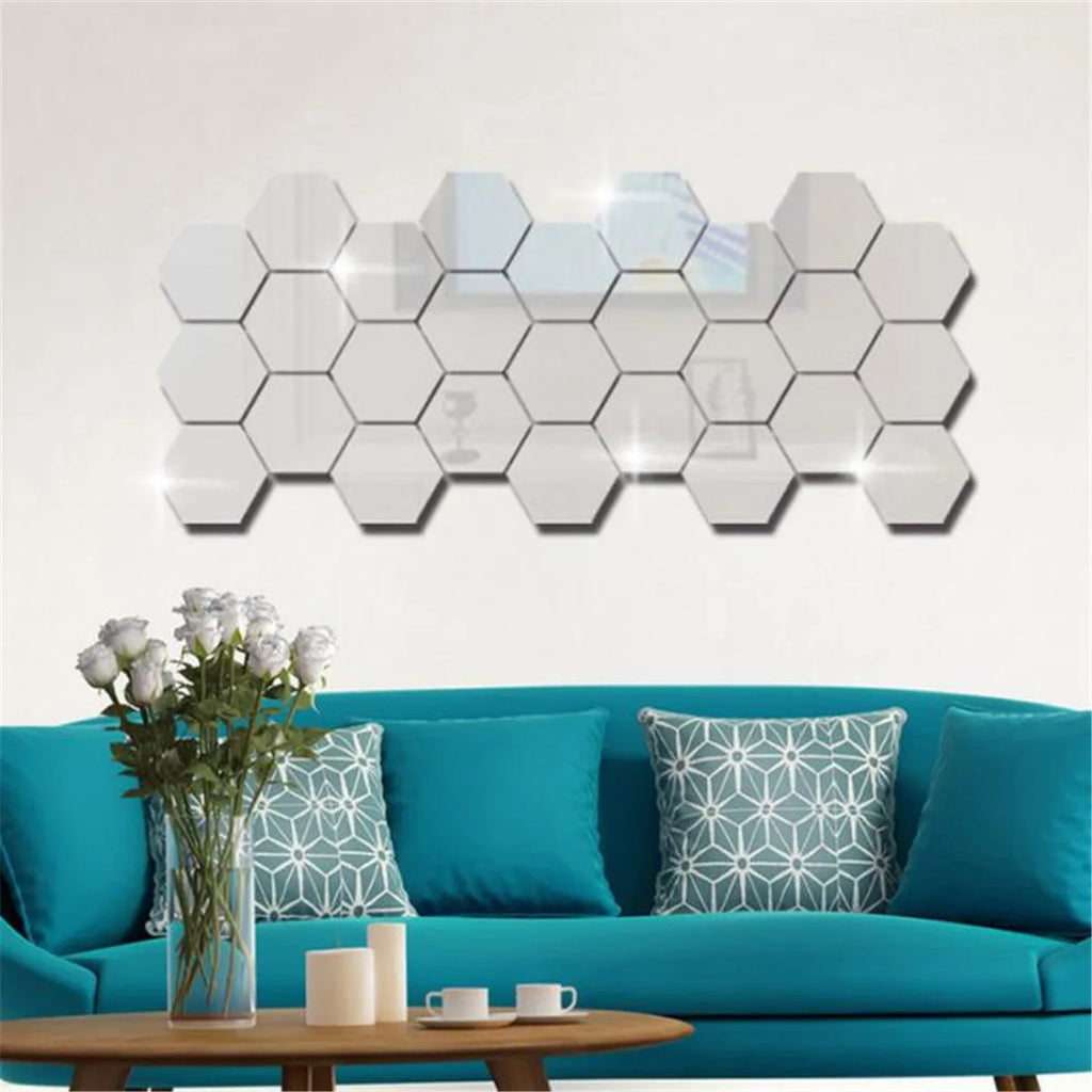 Silver hexagonal acrylic mirror wall sticker with PS build, 100x85x50mm, on a wall surface