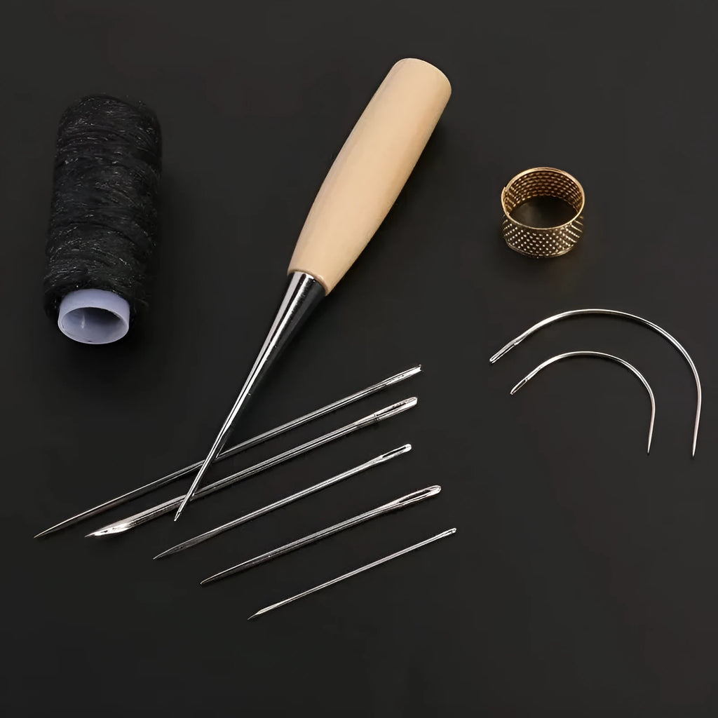 Four-piece leather tool set with alloy steel hand-stitching tools in black storage case