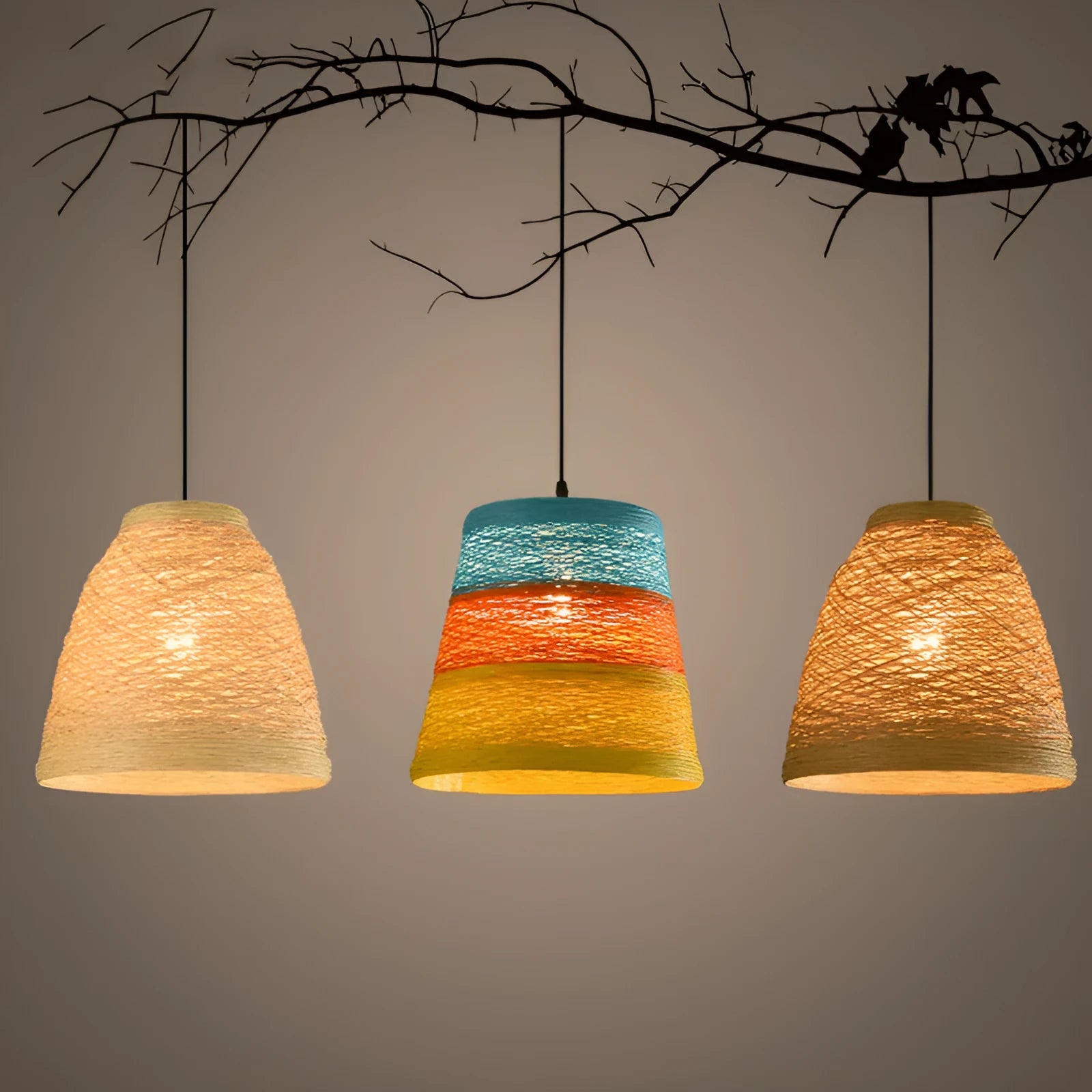 Natural woven rattan hanging lamp with adjustable cord in a light coffee colour, suspended from a ceiling.