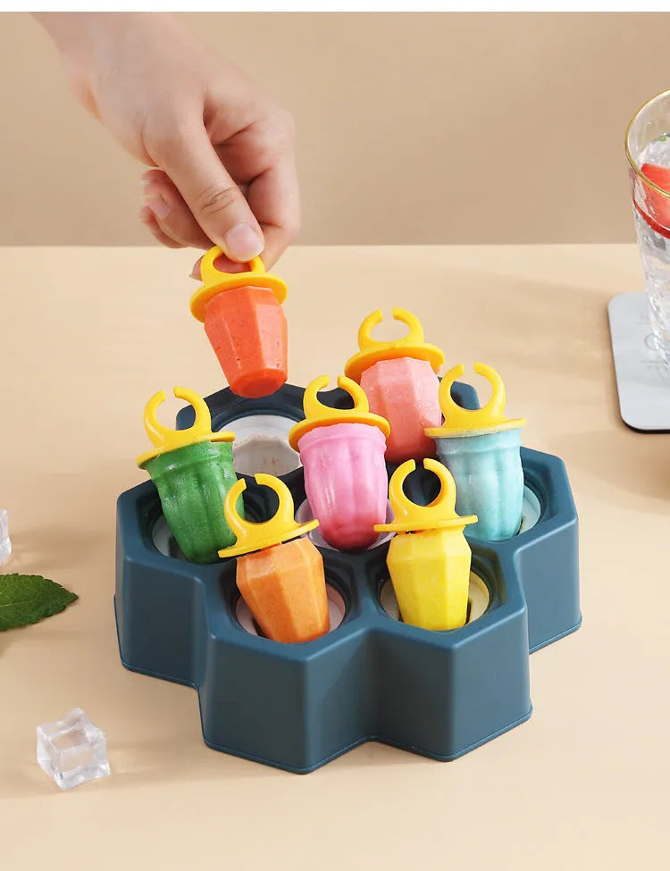 Plastic soft cartoon anti-dripping ice mould in brown honeycomb and navy blue rectangle shapes