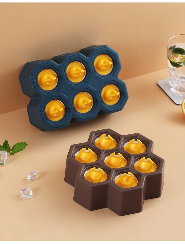 Plastic soft cartoon anti-dripping ice mould in brown honeycomb and navy blue rectangle shapes