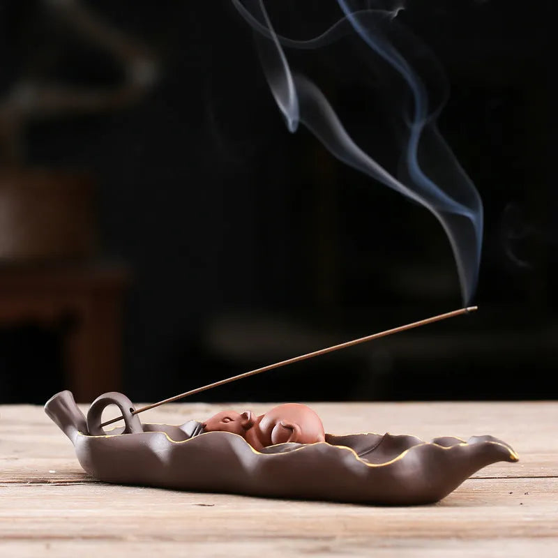 Purple clay ceramic lying incense holder with golden rat decoration