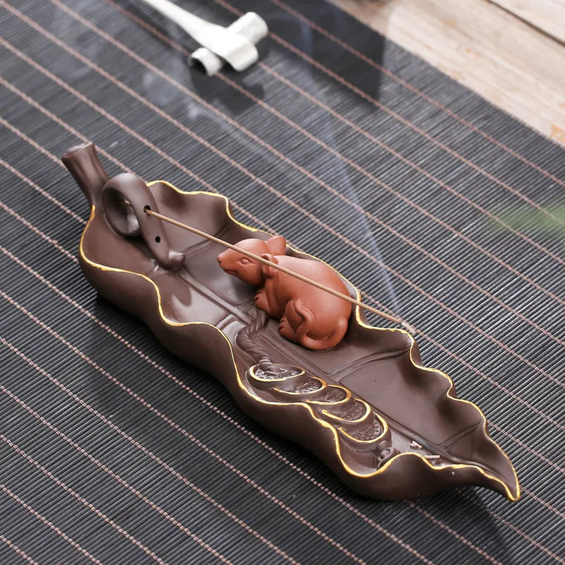 Purple clay ceramic lying incense holder with golden rat decoration