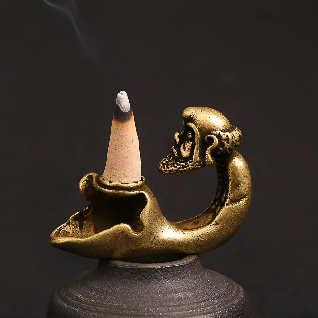 Classical brass dharma incense stick hanging ornament measuring 60cm wide by 41cm tall