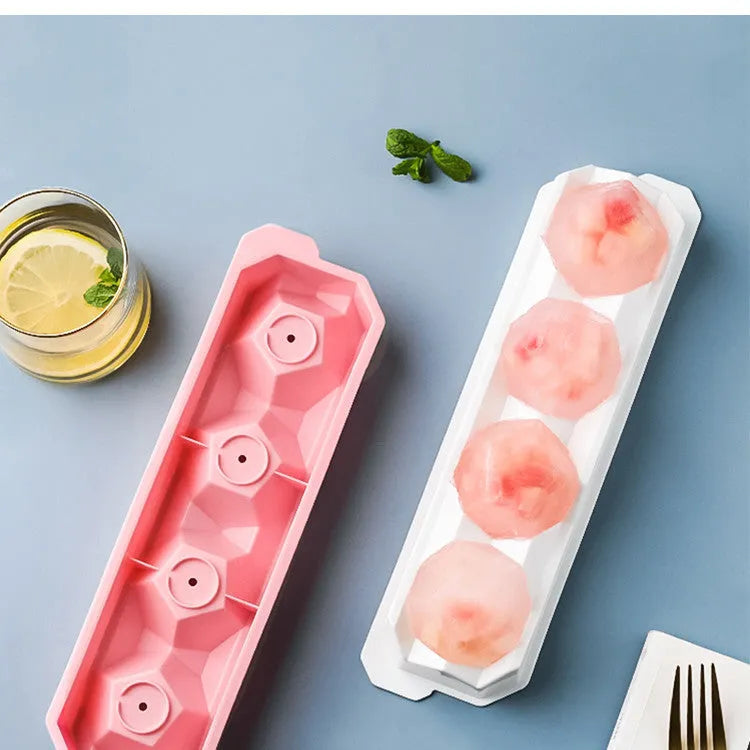 Silicone ice tray showing hockey puck, round, and pentagon shaped moulds in various colour options