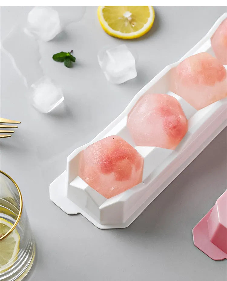 Silicone ice tray showing hockey puck, round, and pentagon shaped moulds in various colour options
