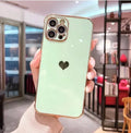 Electroplating love design TPU iPhone back cover case in pink, shown on an iPhone 12 model.