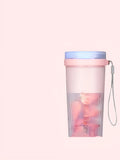 Portable pink electric juicer cup with USB charger and round feeding port