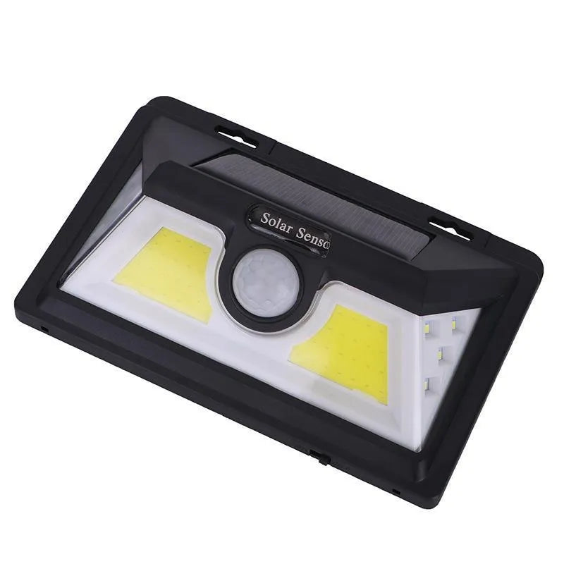 Solar powered outdoor garden lamp with motion sensor and 30 LED lights for automatic pathway illumination