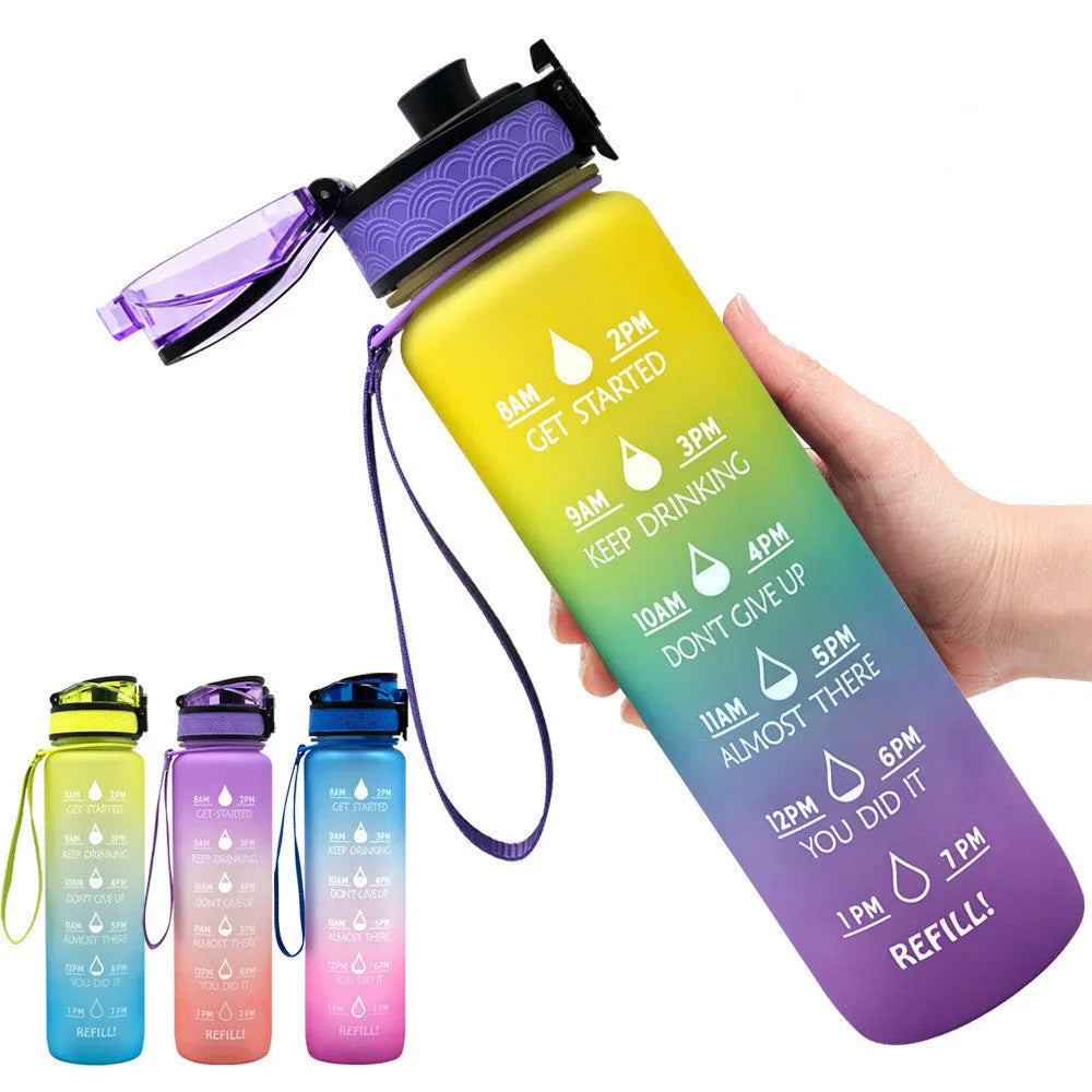 Blue and red gradient 1-litre Tritan sports water bottle with time markers and a black bounce cover lid.