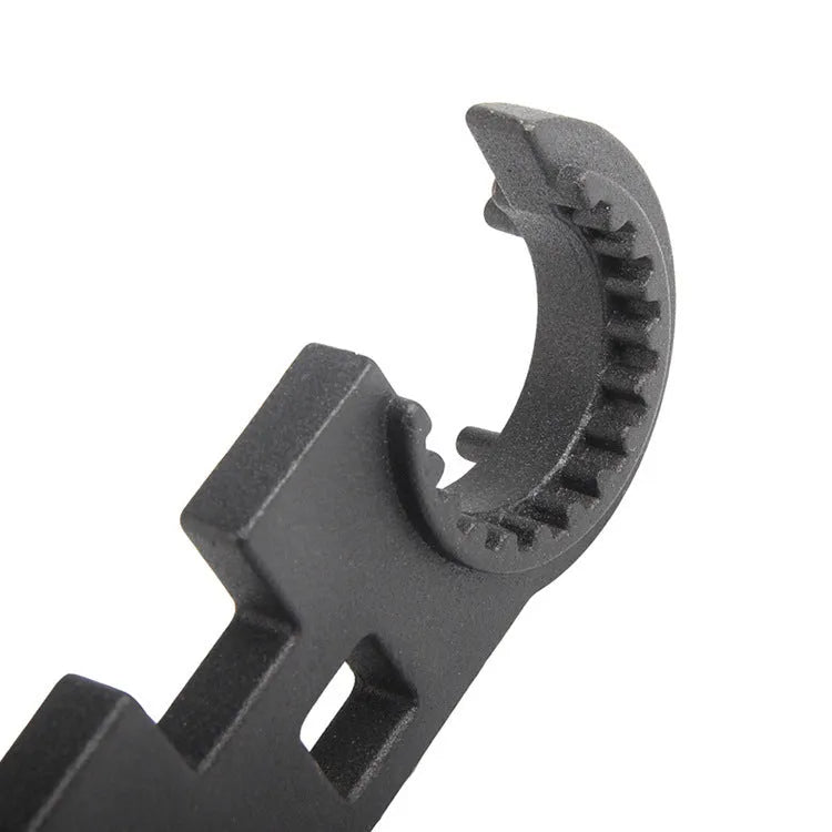 Black all-steel dual purpose combination wrench for Ar15 and M4 firearm maintenance.