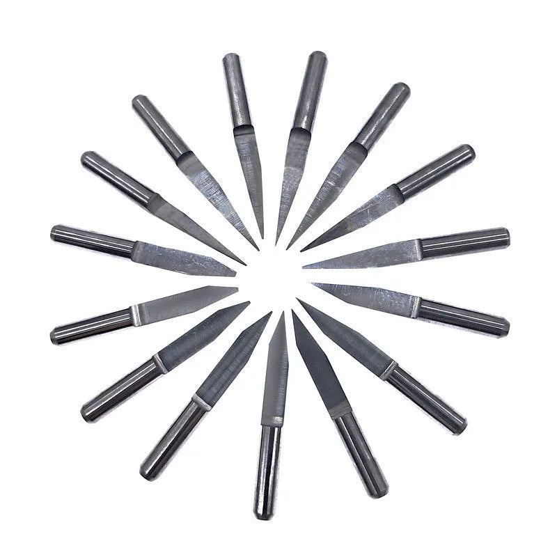 Set of ten tungsten steel flat milling cutter knives for acrylic engraving in a small case.