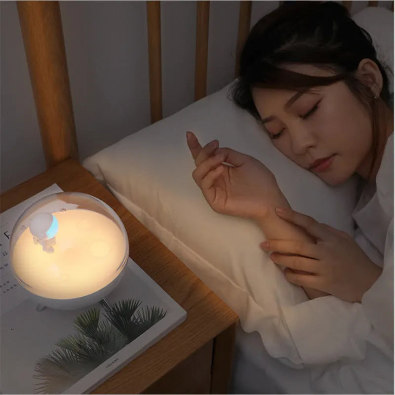 USB-powered cartoon LED night light with button switch available in blue or white light colours
