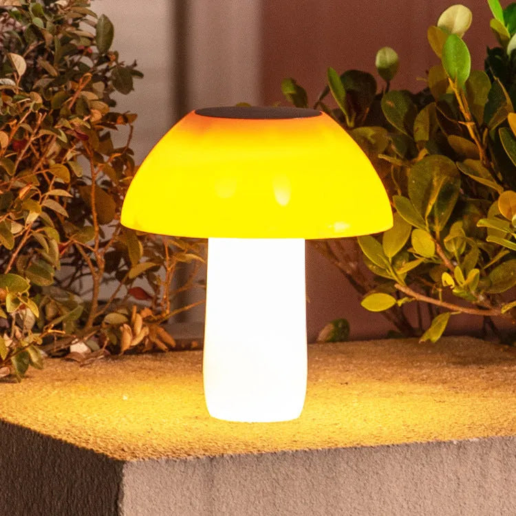 Solar garden mushroom ground plug light showing white and warm white LED light options