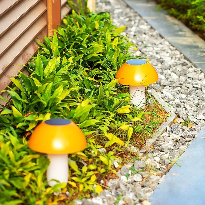 Solar garden mushroom ground plug light showing white and warm white LED light options