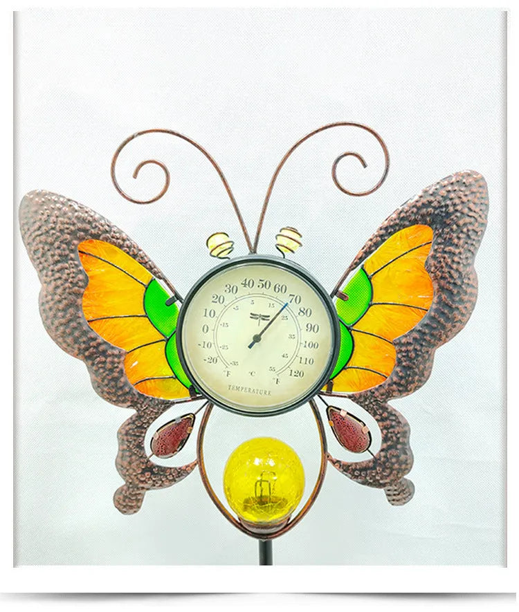 Solar garden thermometer butterfly stake measuring 30x6x110cm inserted in lawn