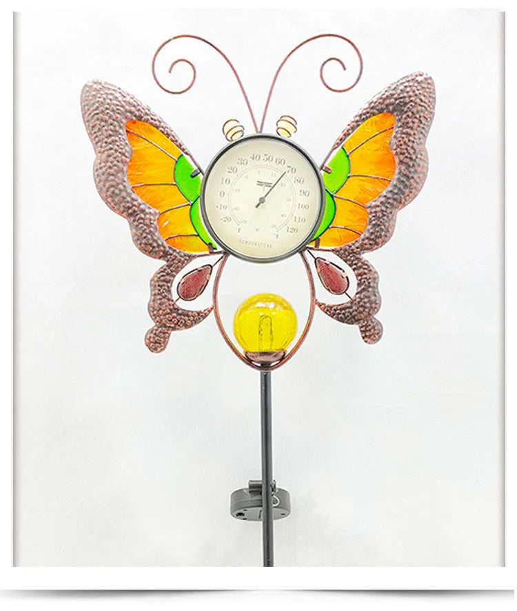 Solar garden thermometer butterfly stake measuring 30x6x110cm inserted in lawn