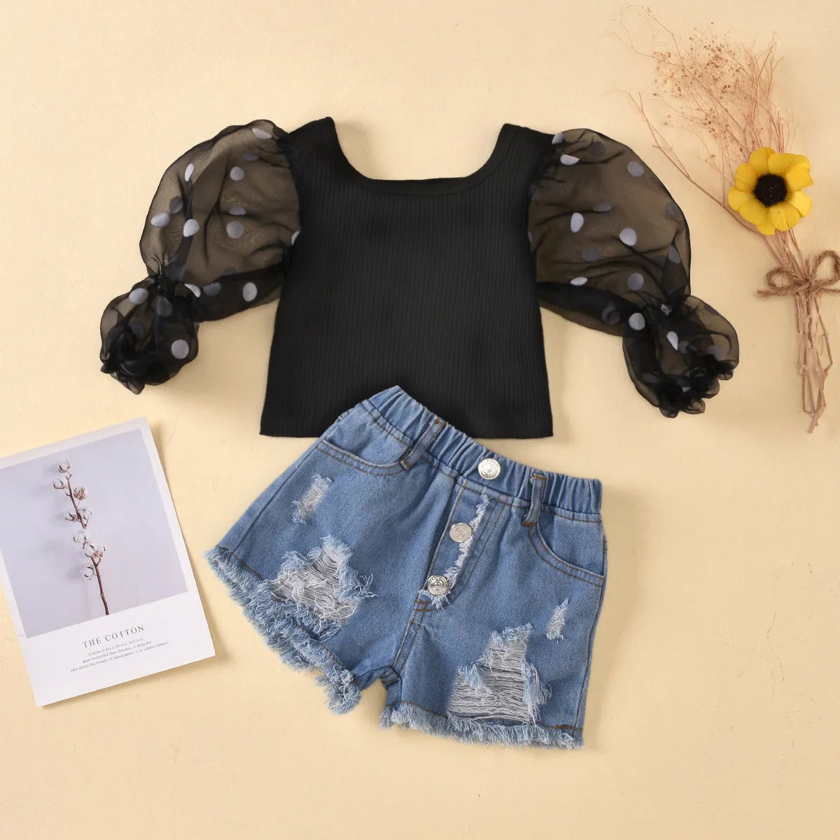 Children's black cotton mesh long sleeve top with dot detailed sleeves and ripped denim shorts suit set