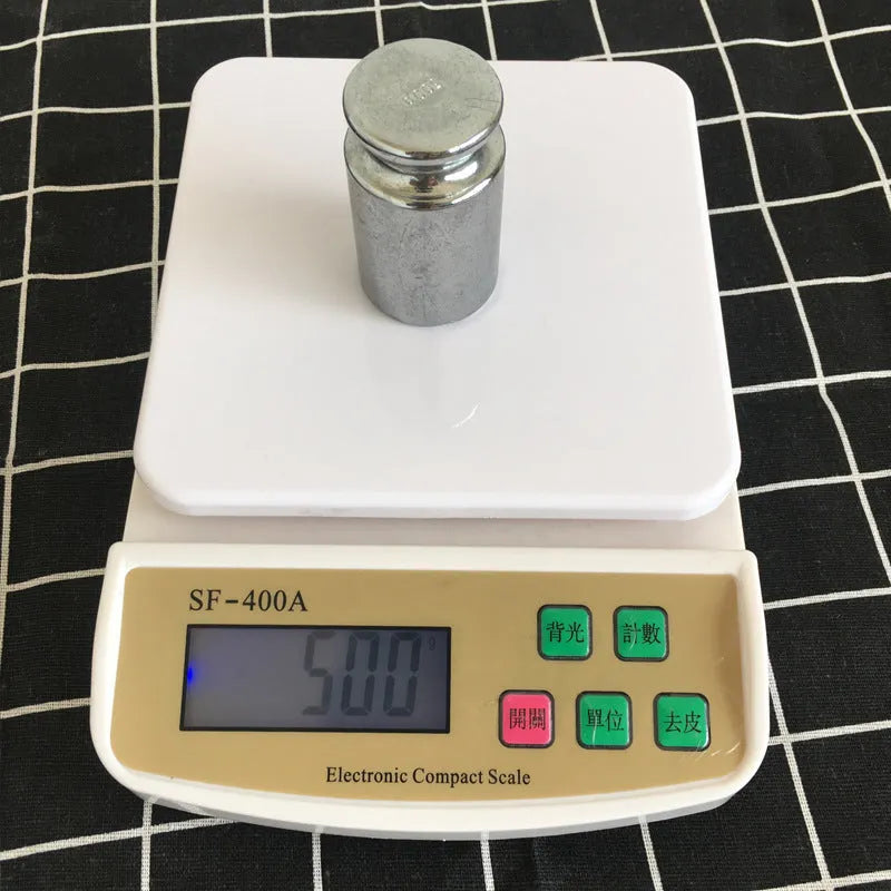 SF-400A black electronic kitchen scale with digital display showing weight measurement