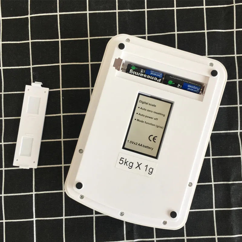 SF-400A black electronic kitchen scale with digital display showing weight measurement