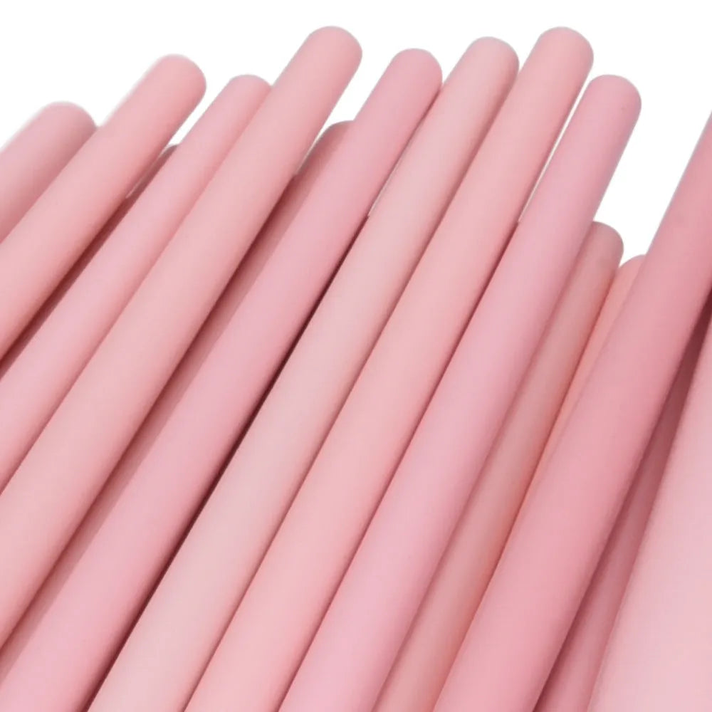 Makeup brush set with nylon bristles and wood handles in a portable size, available in beige or pink.