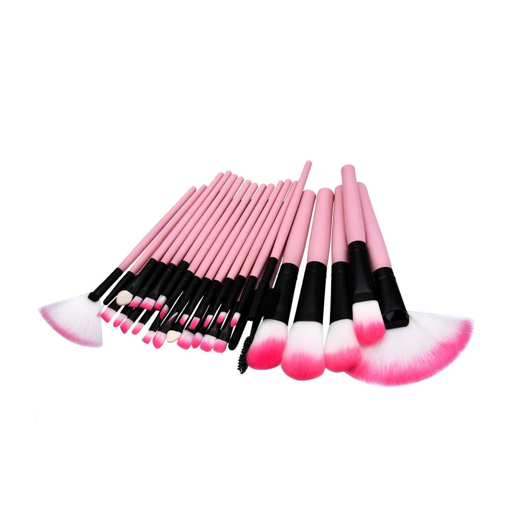 Makeup brush set with nylon bristles and wood handles in a portable size, available in beige or pink.