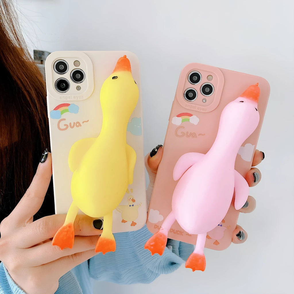 Cartoon printed silicone back cover case for iPhone on a yellow background.
