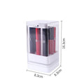 Press-lift lipstick storage box with clear lid and internal grids, shown in pink on a desktop.