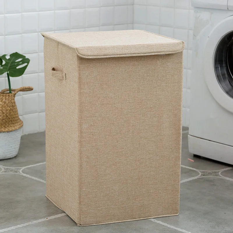 Fabric clothes sorting box in beige colour with two size options for bathroom laundry storage