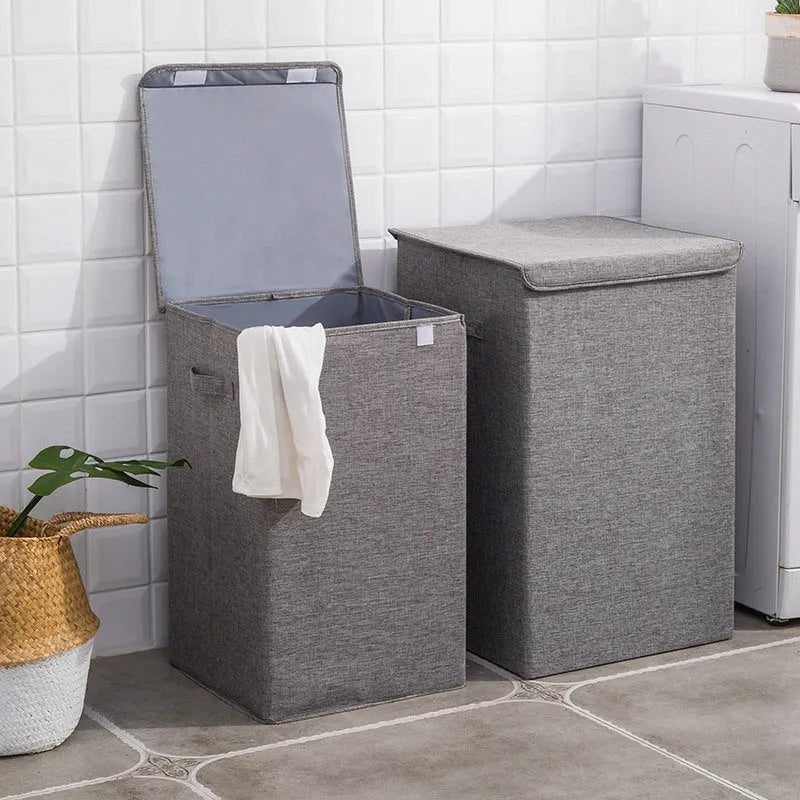 Fabric clothes sorting box in beige colour with two size options for bathroom laundry storage
