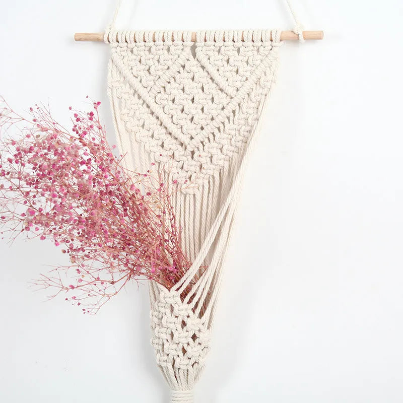 White handwoven cotton wall tapestry with a rectangular grid pattern, measuring 30cm by 70cm.
