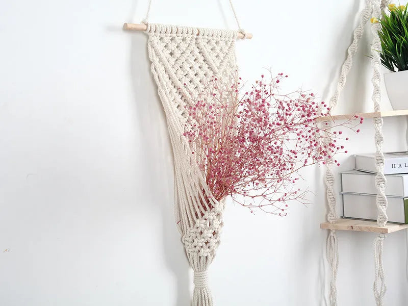 White handwoven cotton wall tapestry with a rectangular grid pattern, measuring 30cm by 70cm.