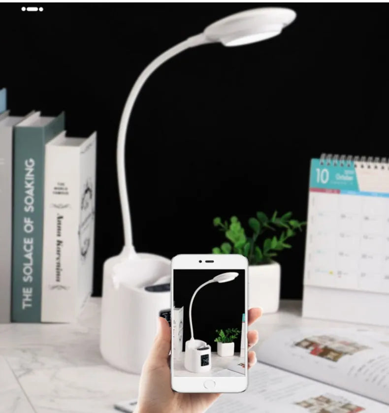 White USB rechargeable desk lamp with adjustable neck and touch control switch.