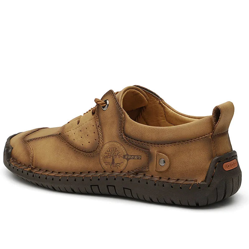Men's black microfiber casual leather shoes with round toe on a plain background