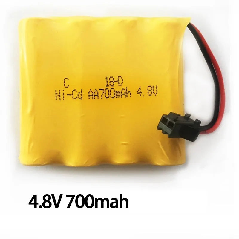 Blue and yellow 1:18 scale remote control drift car with 2.4GHz transmitter on a flat surface
