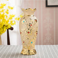 Ceramic vase with electroplated gold finish, European style, 22.5cm height, on a tabletop
