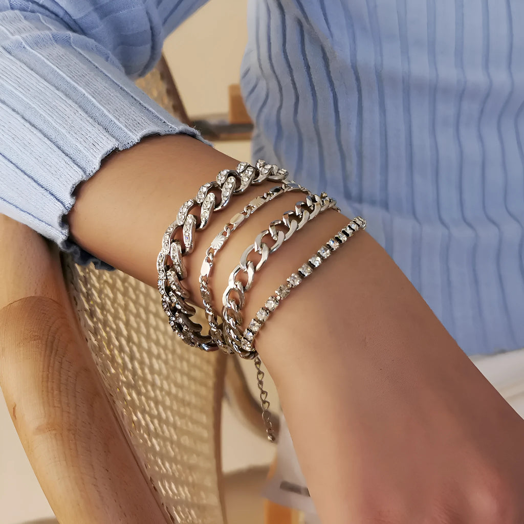 Women's snake bone chain bracelet in electroplated gold or silver metal with geometric retro style links