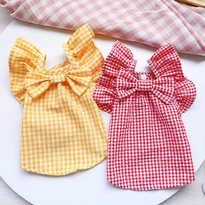 Red check bowknot pet shirt on small dog, casual polyester outfit in red with bowknot detail