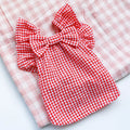 Red check bowknot pet shirt on small dog, casual polyester outfit in red with bowknot detail