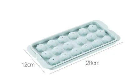 Sky blue and pink 3D round ice cube mould trays showing spherical cavities.