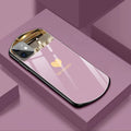 Mirror-finish iPhone case with the word Love, shown in pink, white, black, and wine red colour options.