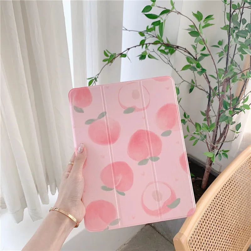 iPad protective case in peach or strawberry TPU leather with clamshell holster cover and painted fruit design