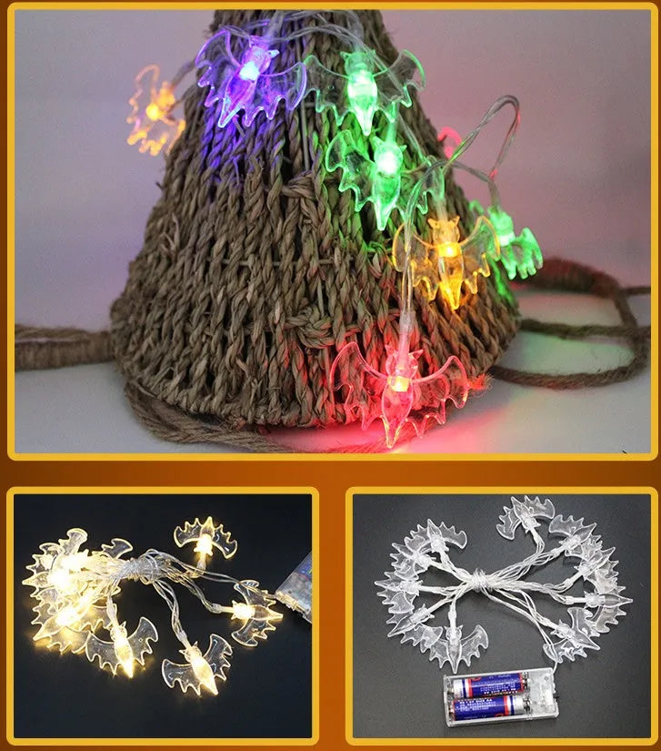 Halloween LED string lights with pumpkin, bat, and ghost pendants on a white wire