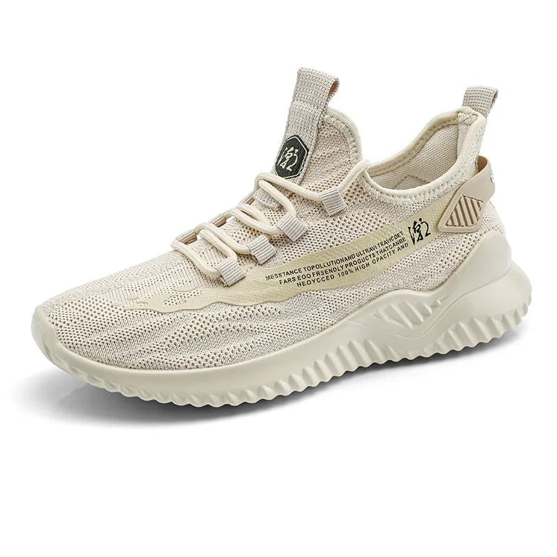 Men's white low-top sports shoes with mesh upper and rubber sole, laces tied.