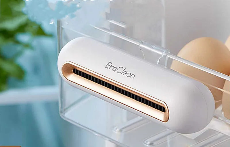 Rose gold USB car air purifier and deodoriser unit for small spaces.