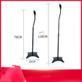Black tripod speaker stand holding an iPhone for use as a bookshelf satellite speaker.