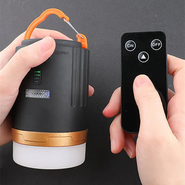 Black remote control camping light with LED illumination for outdoor emergencies and tent use
