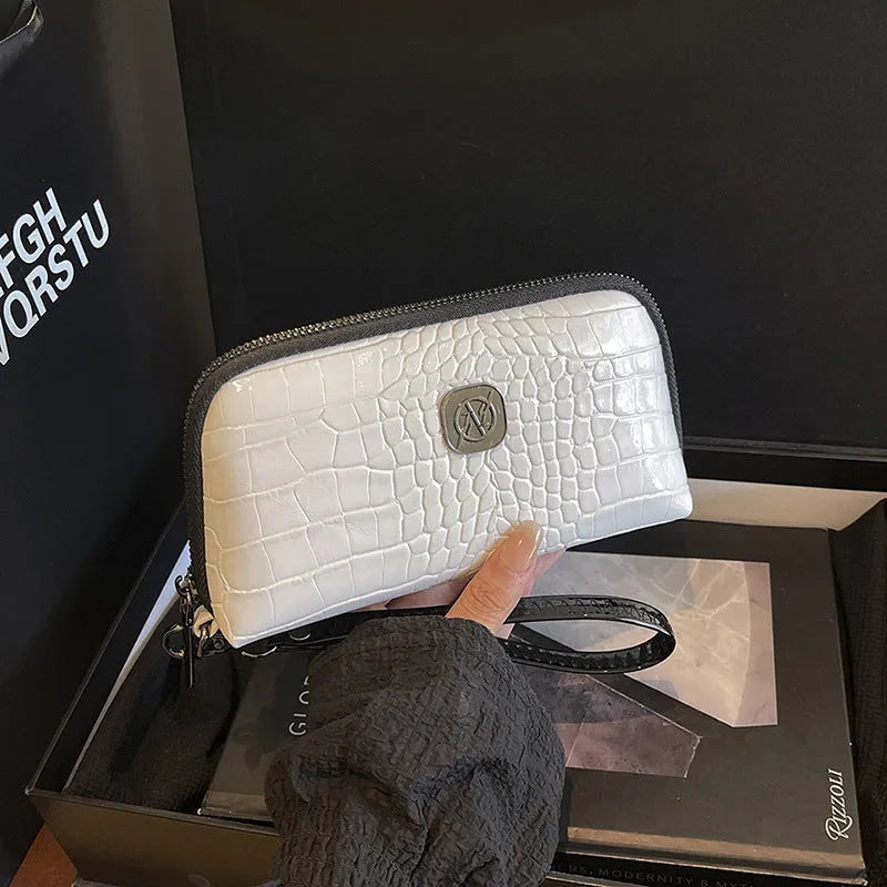 Hand-held rectangular PU mobile phone bag with crystal bamboo pattern in black, shown open to reveal inner pockets.