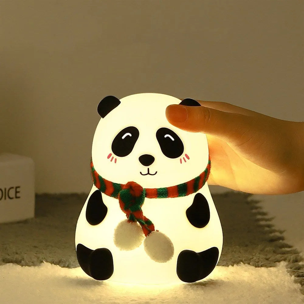 Panda-shaped silicone night light with plated decorative details and USB charging cable